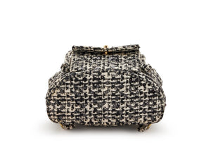 Chanel
Black and White Quilted Sequin Tweed Medium Duma Timeless CC Backpack Gold Hardware, 1994