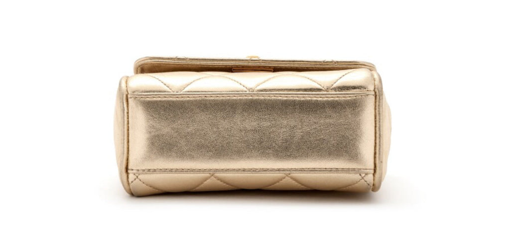 Chanel
Metallic Gold Quilted Lambskin Mini Flap Gold Hardware, 1994-1996