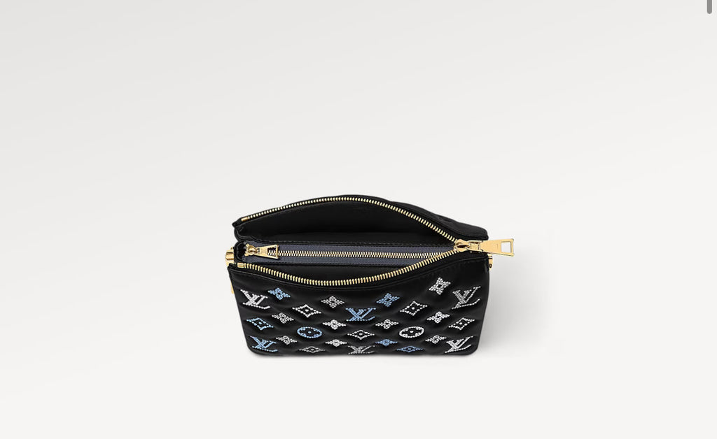 M23582
Borsa Coussin BB