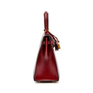 Hermès
Rouge H Box Kelly Sellier 25 Gold Hardware, 2022