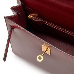 Hermès
Rouge H Box Kelly Sellier 25 Gold Hardware, 2022