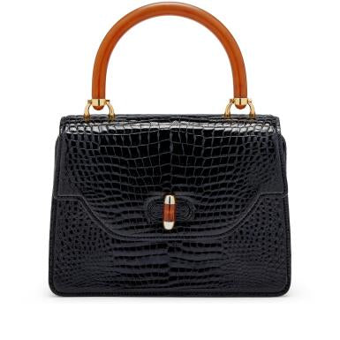 Gucci
Black Crocodile and Bakelite Top Handle Bag Gold Hardware, 1960s