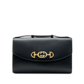 Gucci
Black Calfskin Small Zumi Bag Gold and Silver Hardware