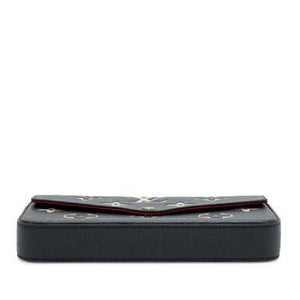 Louis Vuitton
Black and Beige Giant Monogram Empreinte Félicie Pochette Gold Hardware, 2021